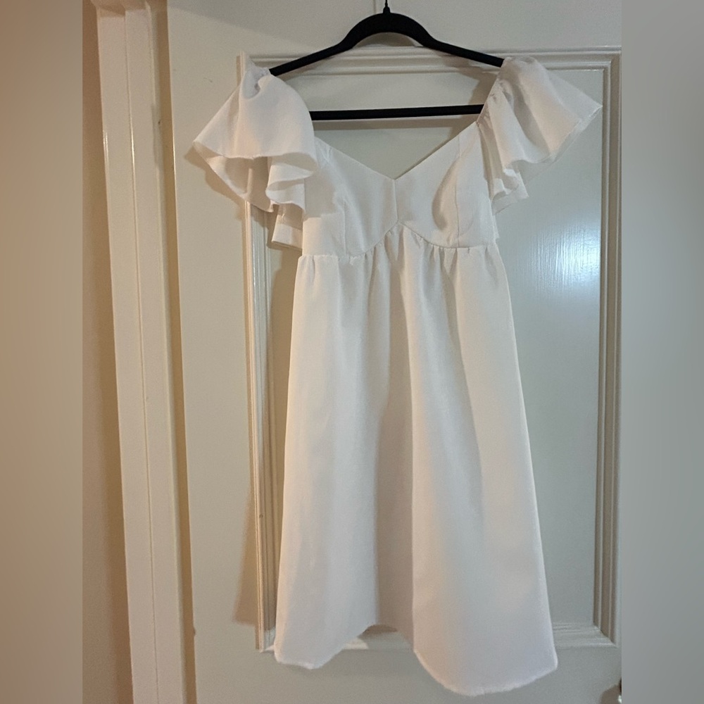 White dress with tie back detail. Size XS/2.